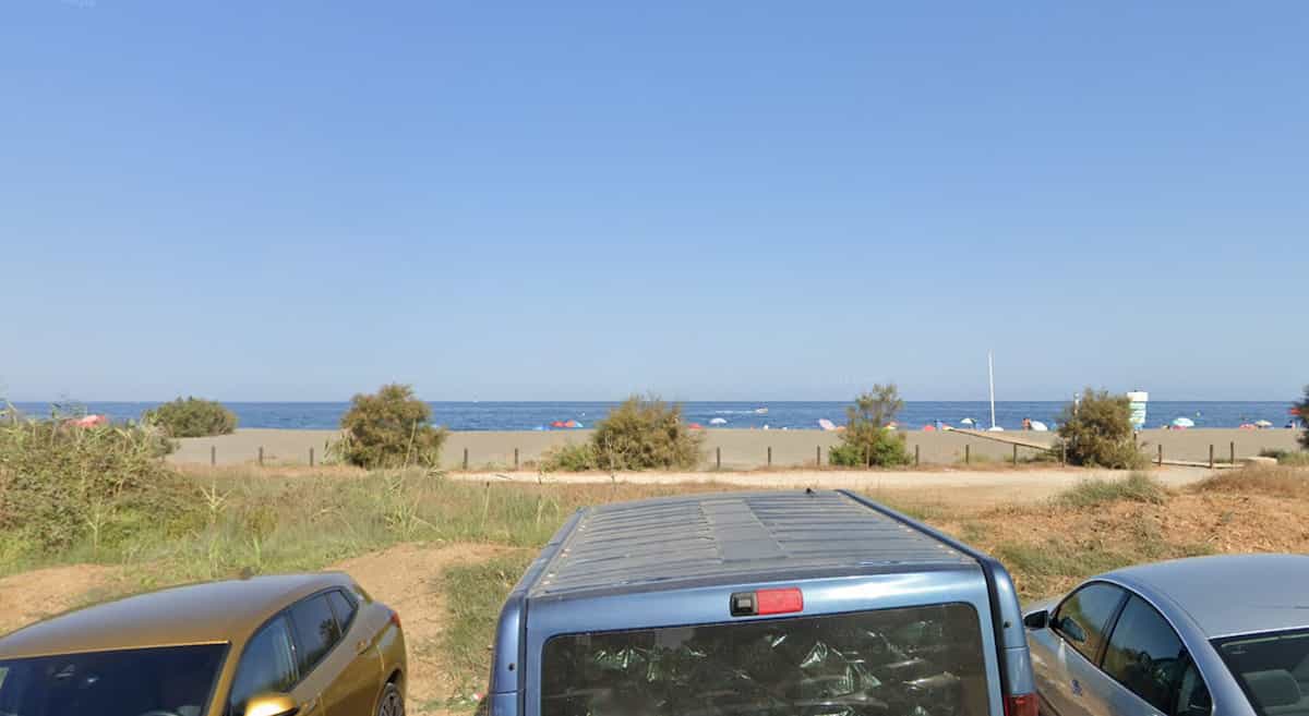 Vue de la Plage Aldea Beach avec son environnement naturel.