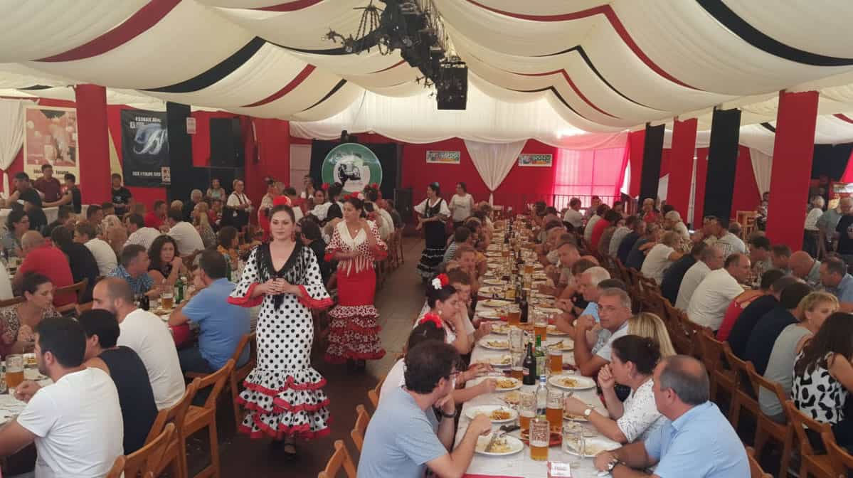 Eating in a caseta at Los Barrios Fair
