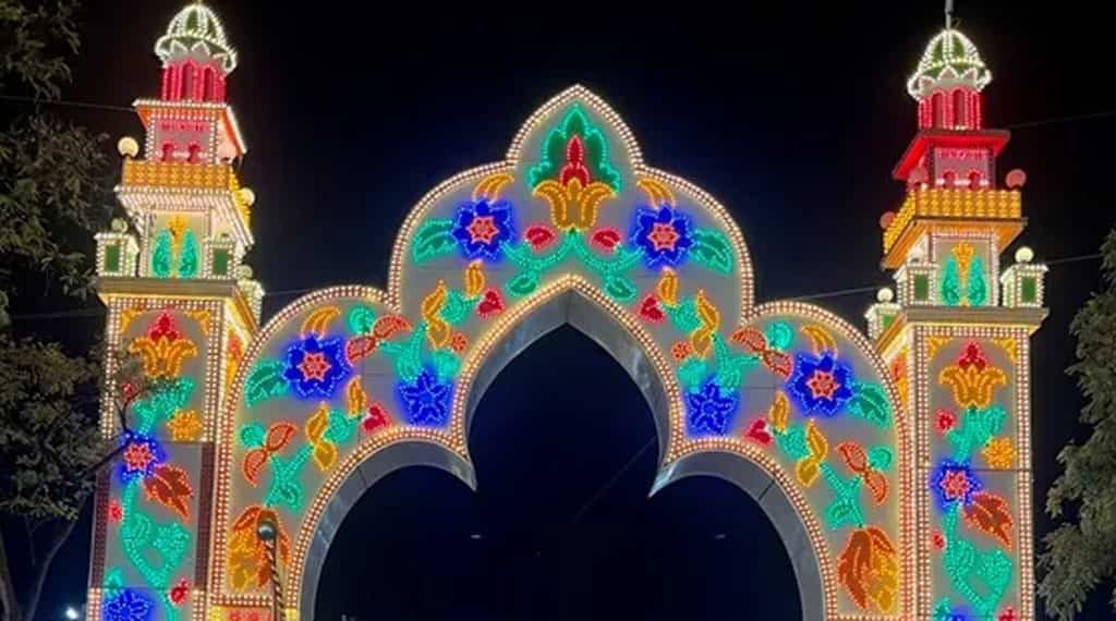 Illuminated entrance arch at San Pedro Alcantara fair